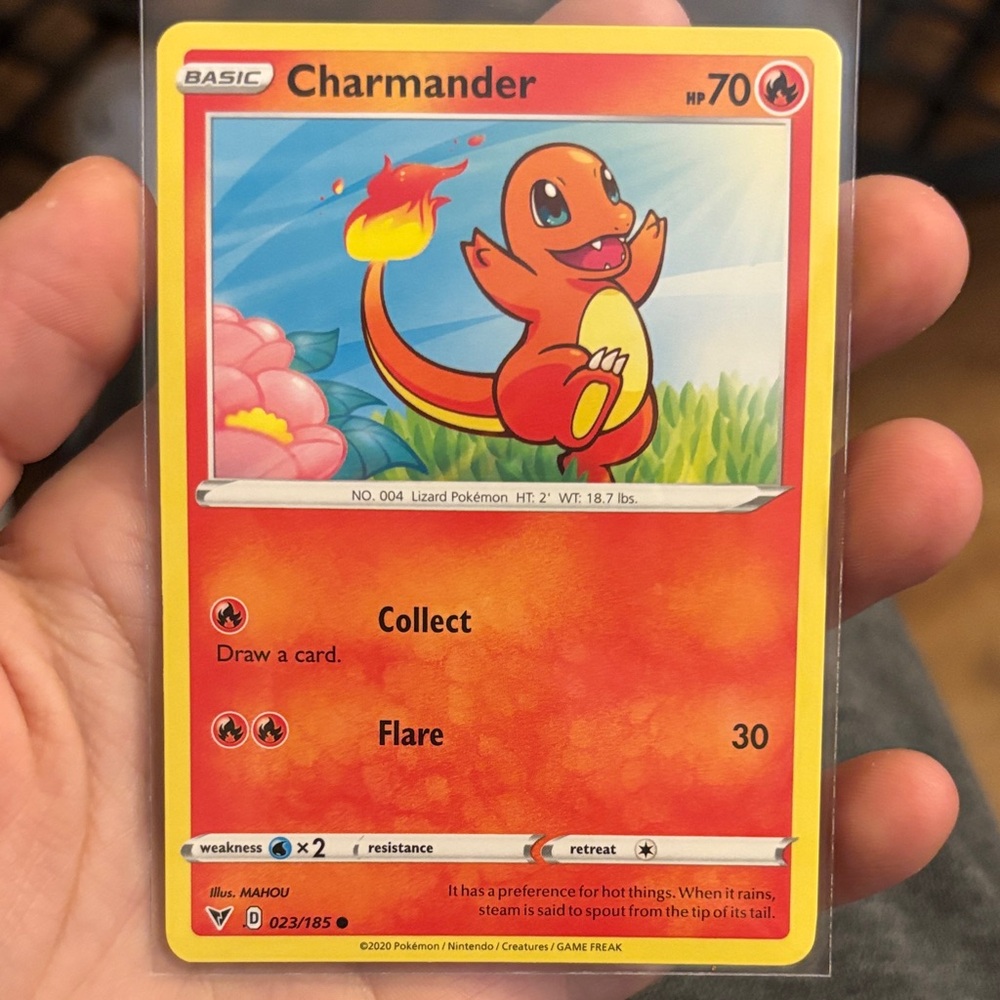 Pokémon Charmander Card with Red and Orange Design